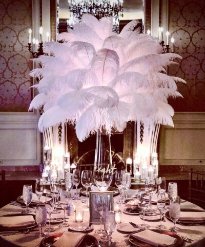 Rose gold candelabra ostrich feather centerpiece