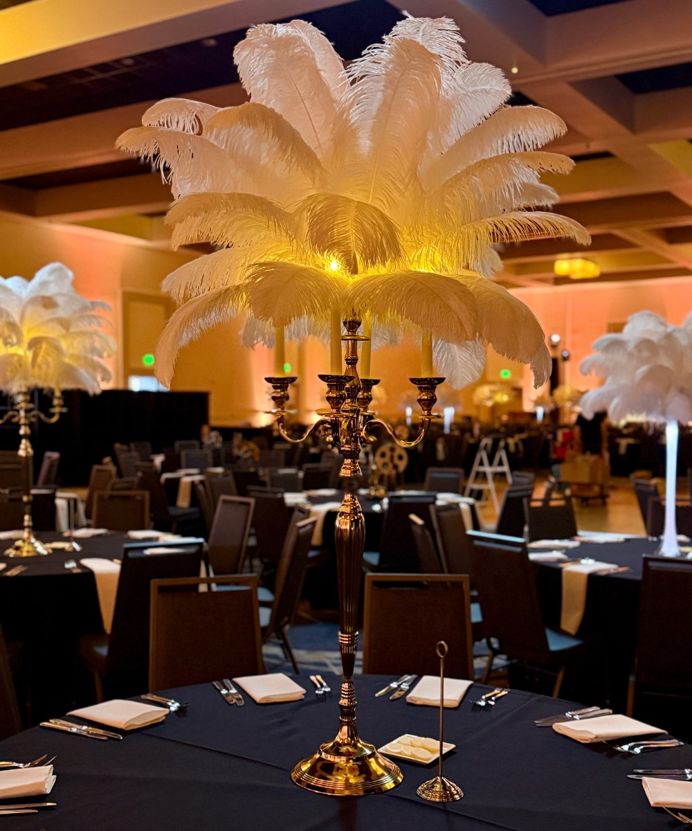 Yellow gold candelabra ostrich feather centerpiece