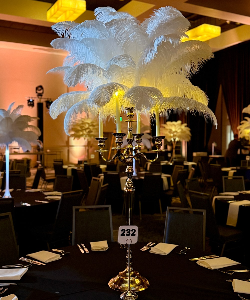 Yellow gold candelabra ostrich feather centerpiece