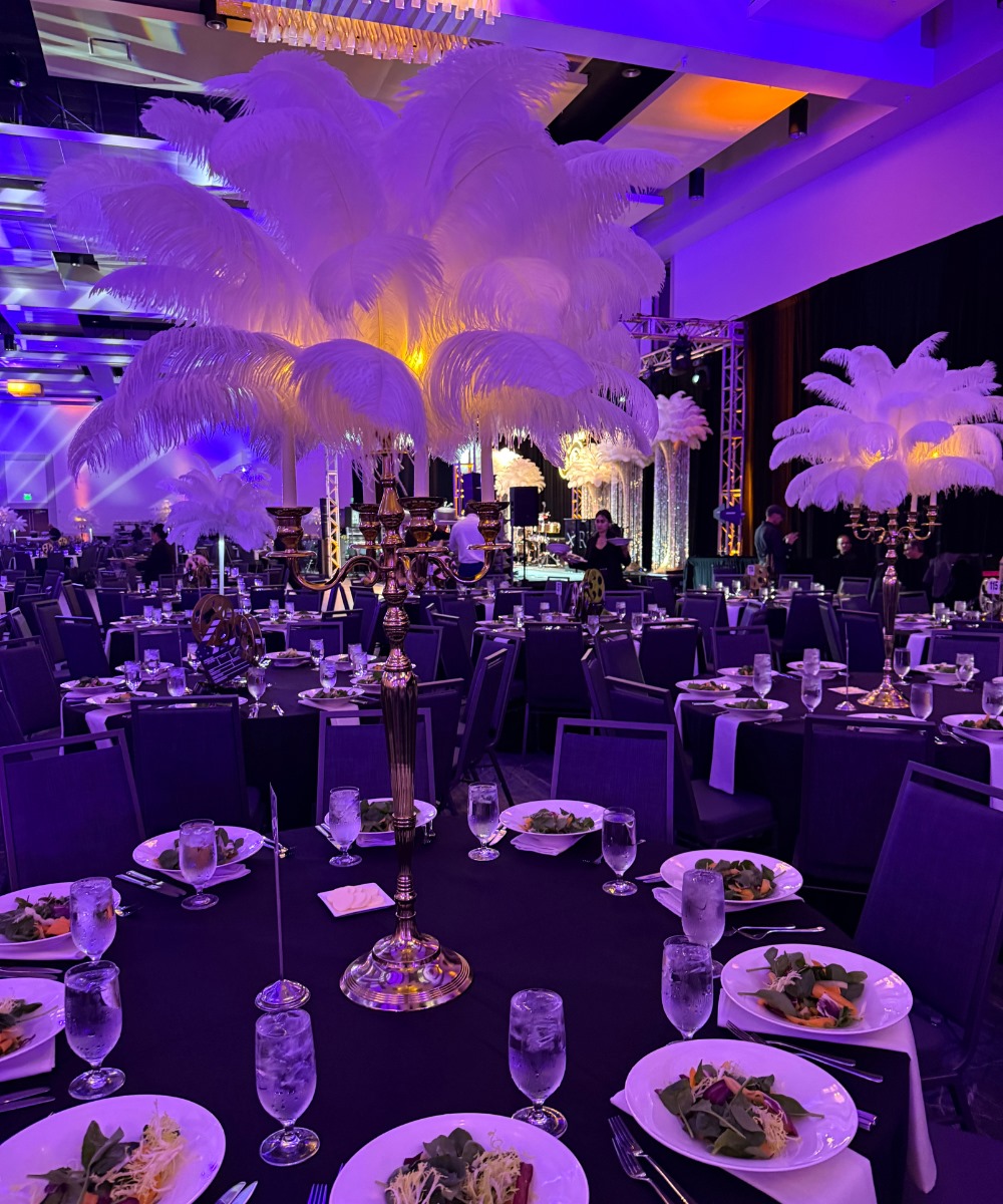 Yellow gold candelabra ostrich feather centerpiece