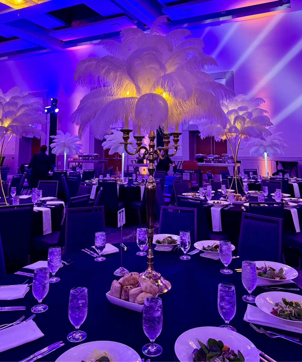 Yellow gold candelabra ostrich feather centerpiece