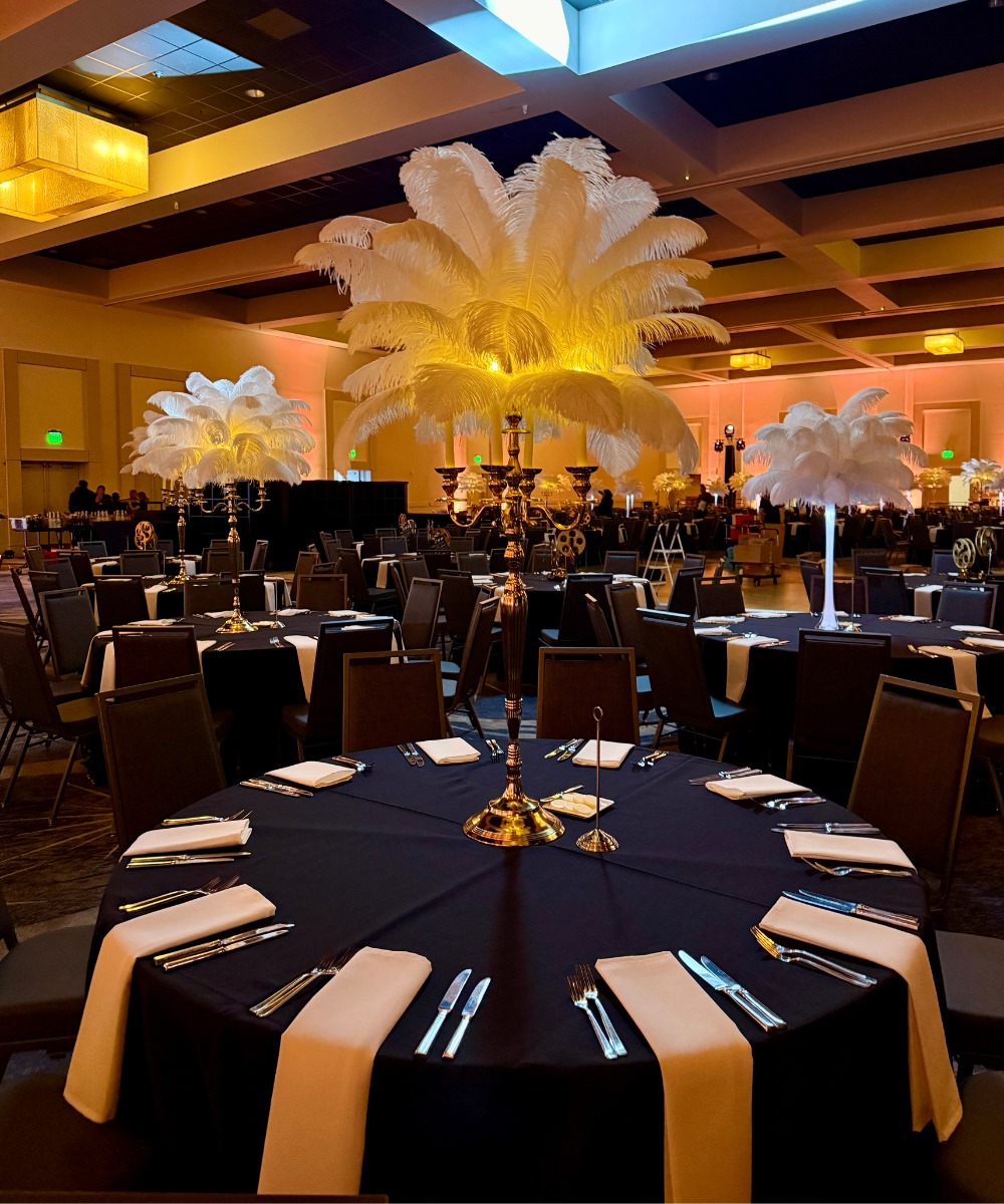 Yellow gold candelabra ostrich feather centerpiece
