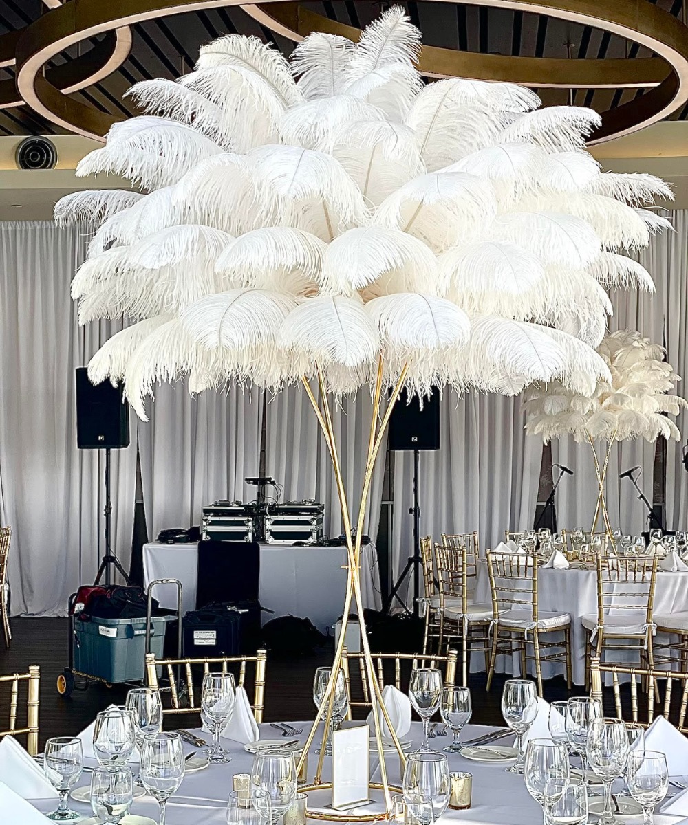 Hourglass gold stand ostrich feathers centerpiece
